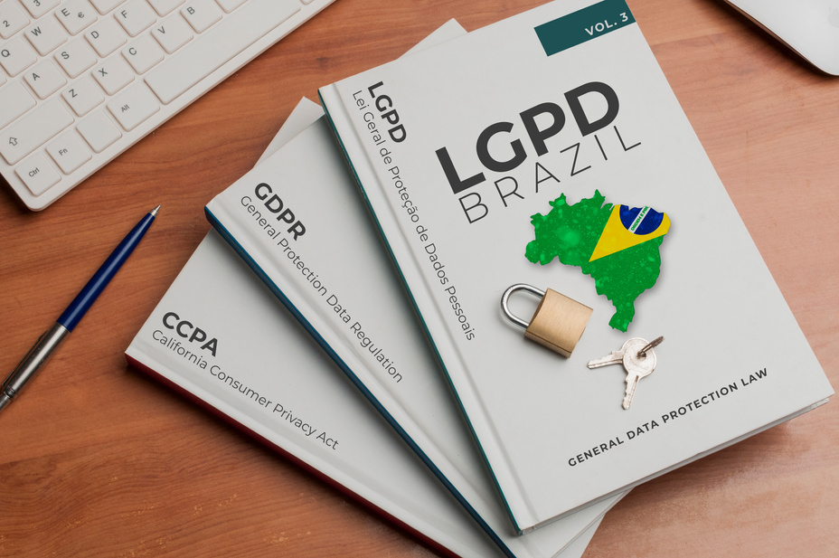 Data protection laws concept: three books shows the names of three data protection laws on their cover: california consumer privacy act, general data protection regulation and lei geral de proteção de dados pessoais (ccpa, gdpr, lgpd)